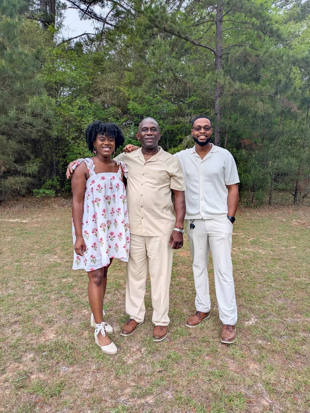 Three members posing outdoors on Easter Sunday