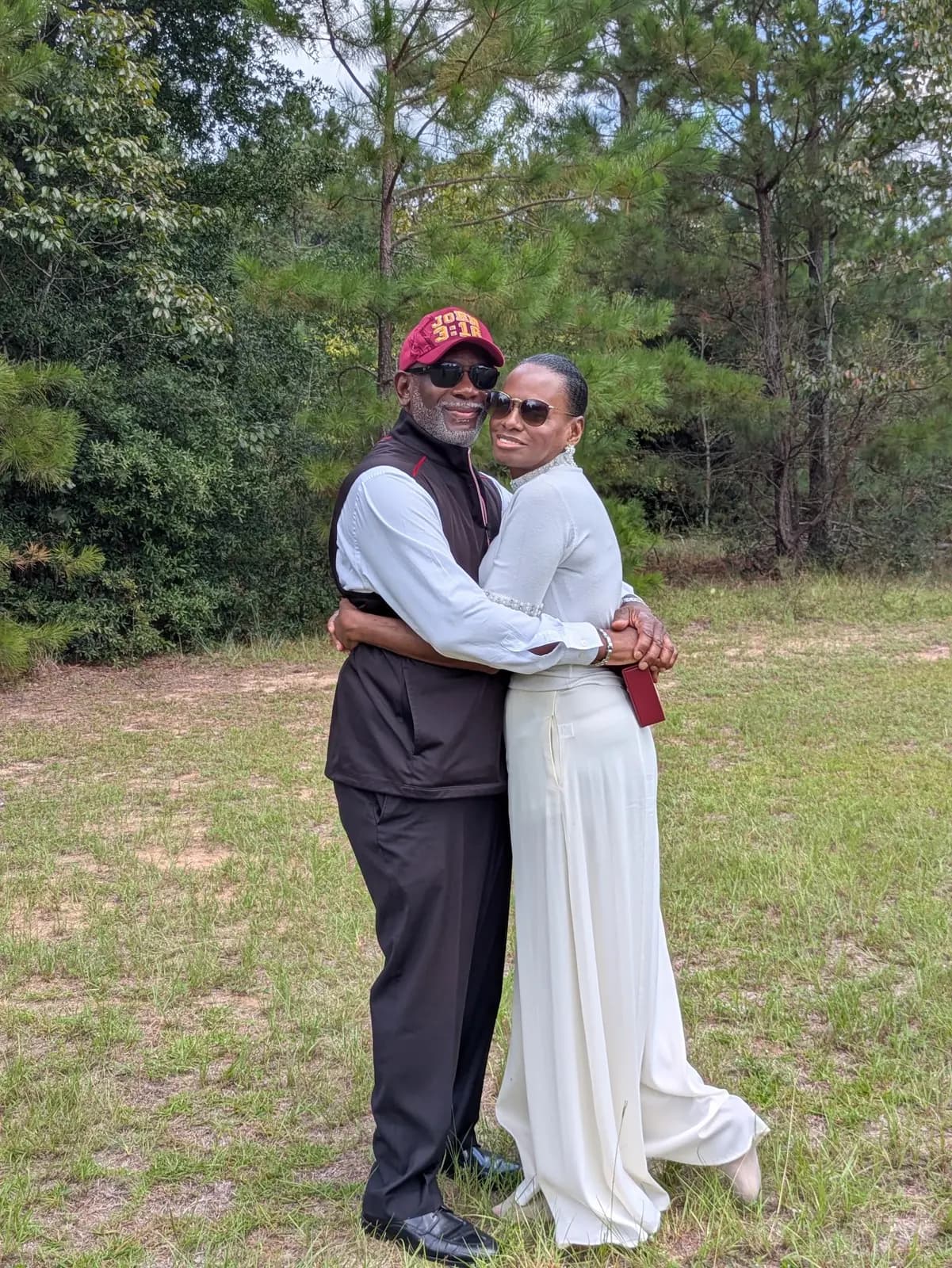 An older couple embracing outdoors after Sunday service