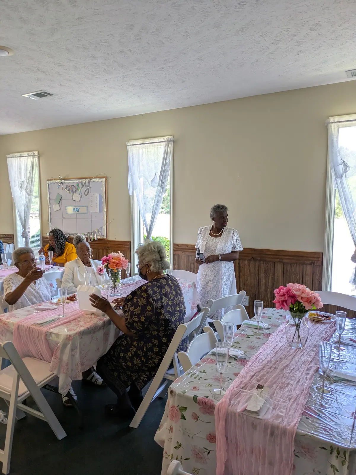 Members seated together at the Mother's Day brunch