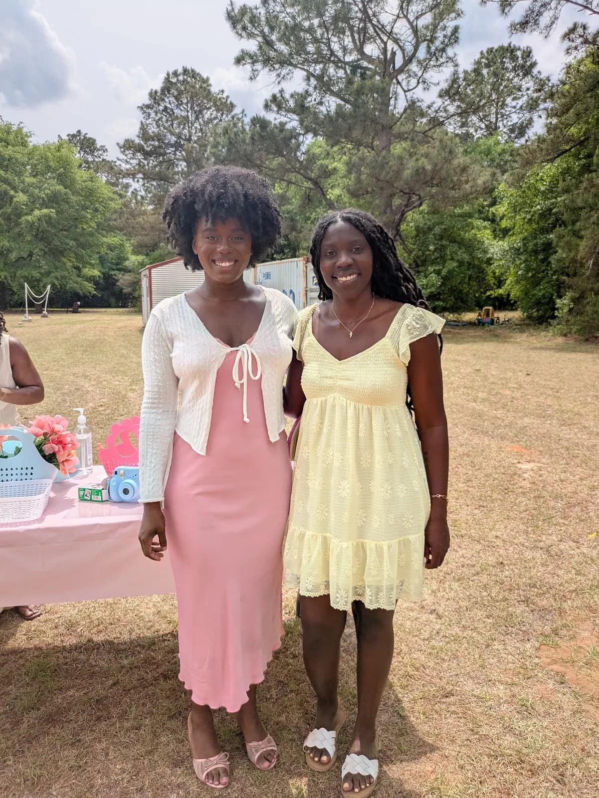 Two members in spring dresses at the picnic